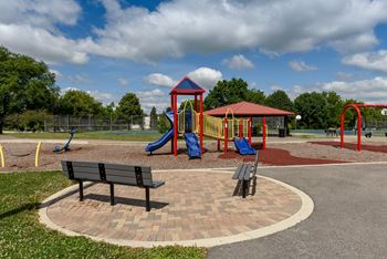 Seating near playground at The Winds at Poplar Creek, 1900 Windsong Drive, IL